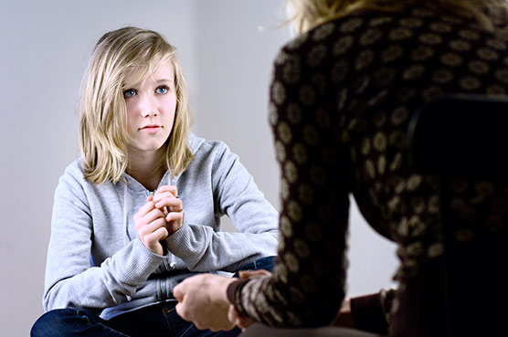 stock-photo-14494710-teenage-girl-talking-to-a-female-counsellor-.jpg